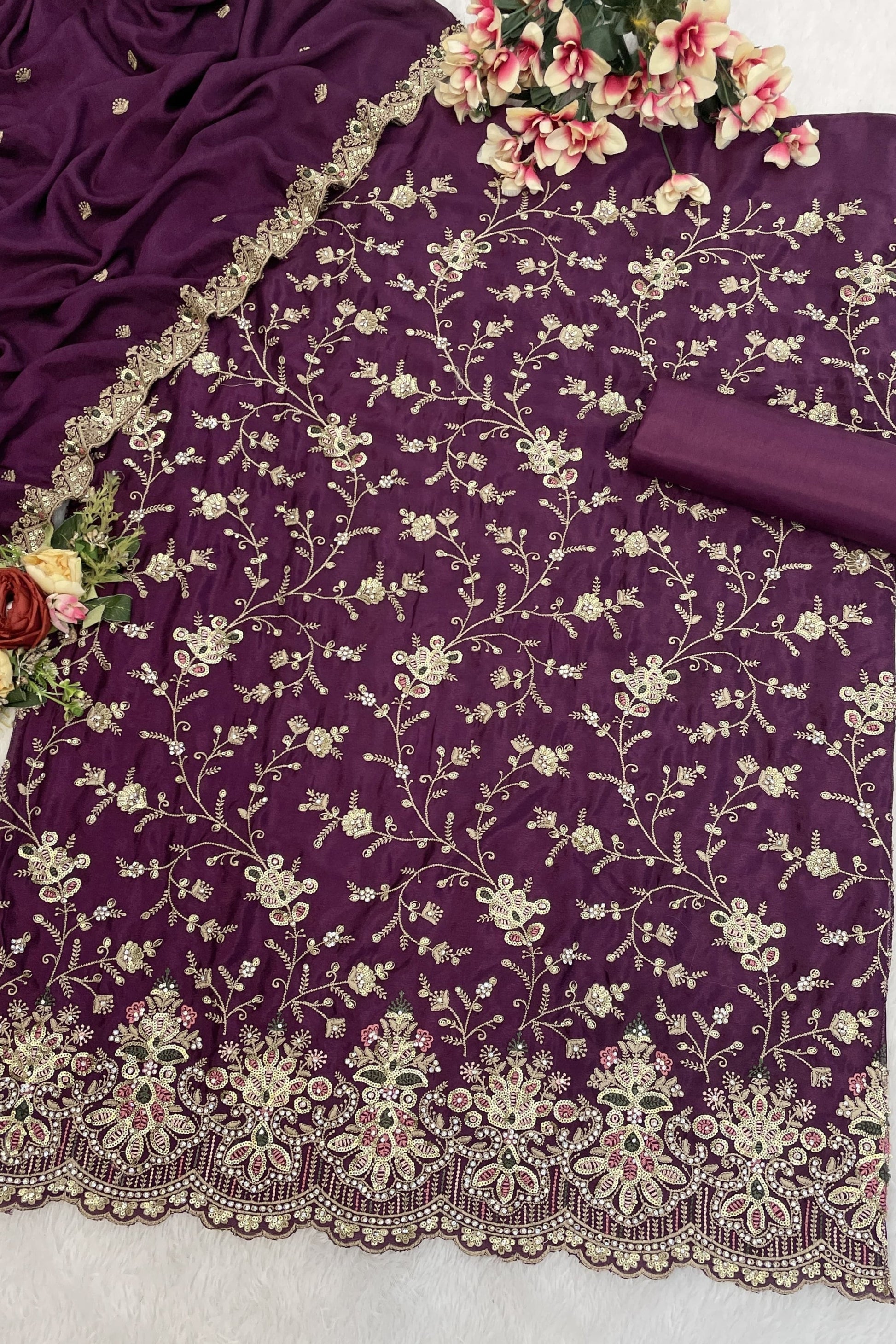 Occasion wear Indian suits ensemble styled for festive event