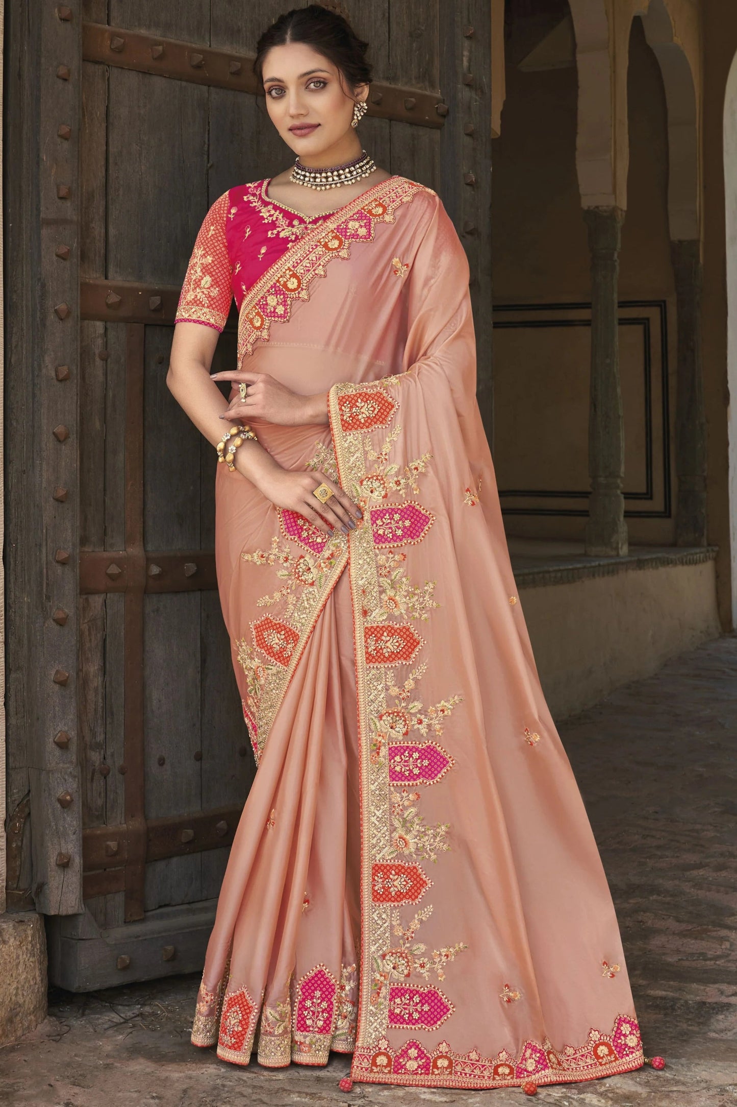 Peach Saree gives a soft and fresh look – perfect for daytime events and breezy celebrations. 
