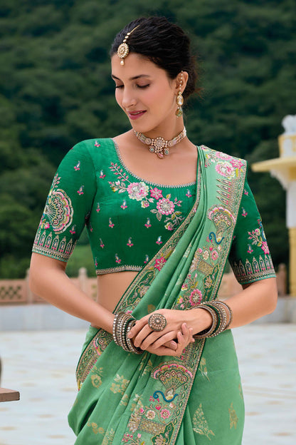 Green Saree symbolizes freshness and festivity – great for Mehndi or family gatherings. 