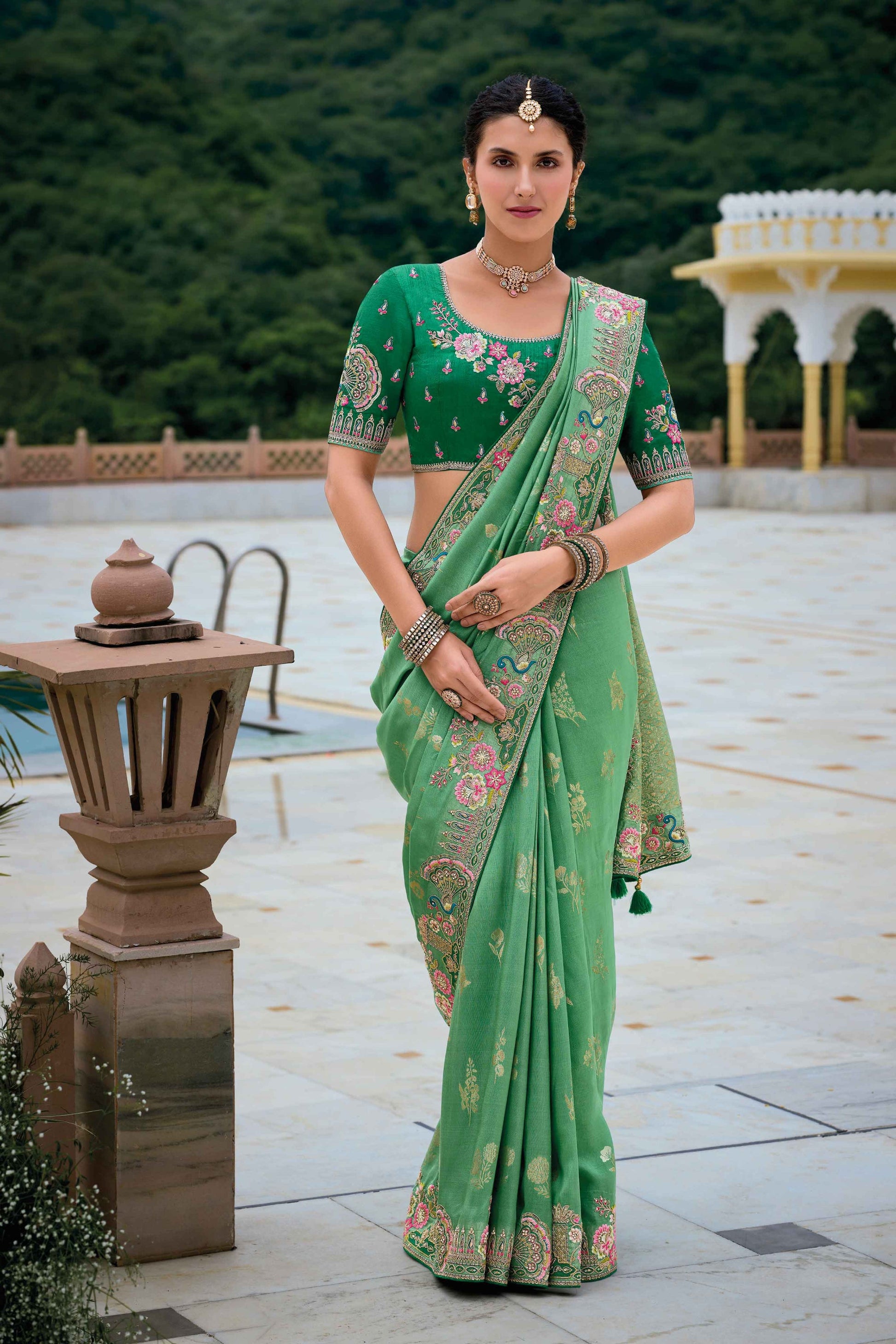 Green Saree symbolizes freshness and festivity – great for Mehndi or family gatherings. 