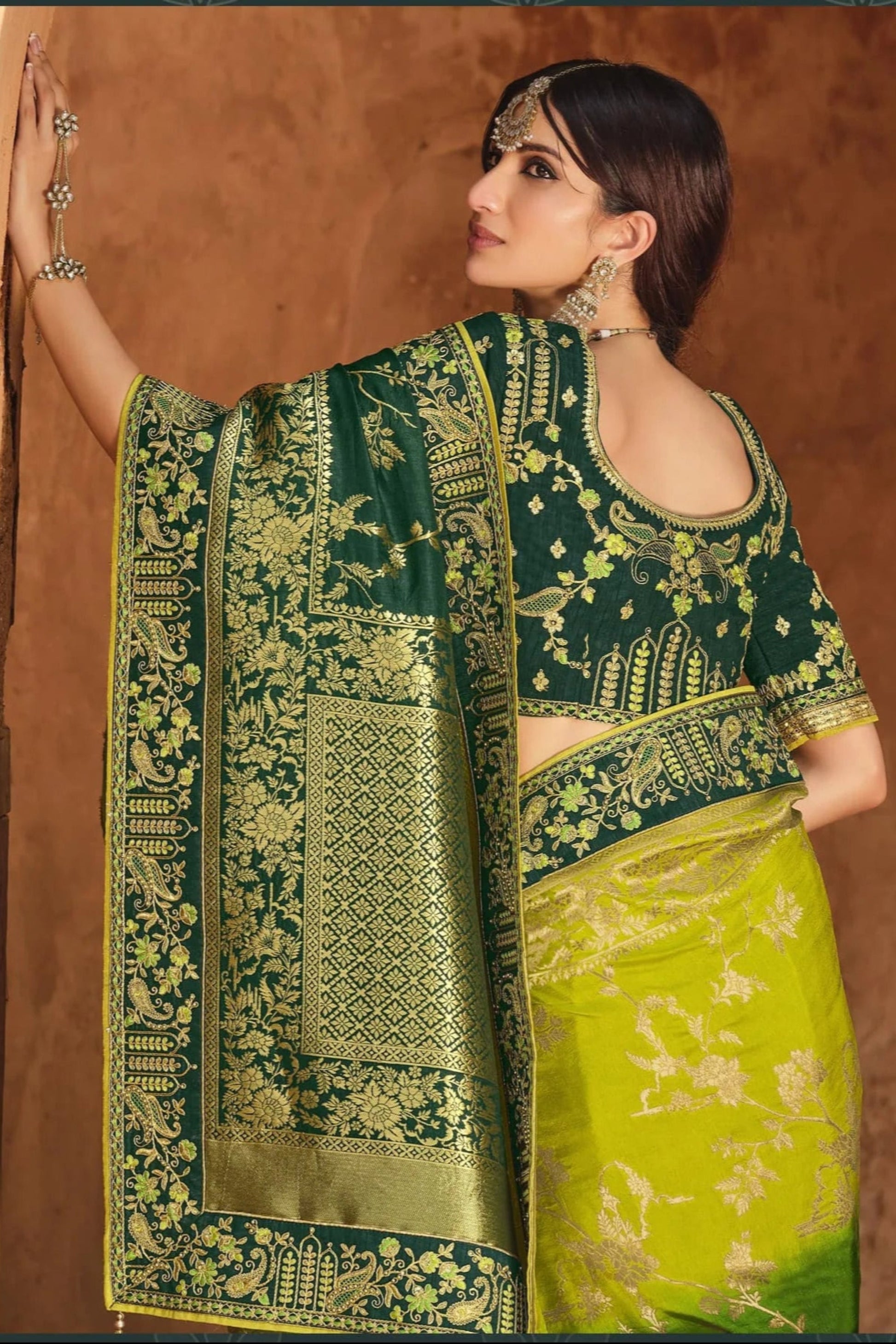 Green Saree symbolizes freshness and festivity – great for Mehndi or family gatherings. 