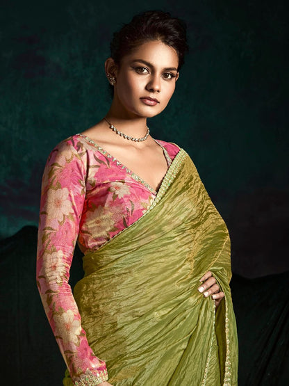 Green Saree symbolizes freshness and festivity – great for Mehndi or family gatherings. 
