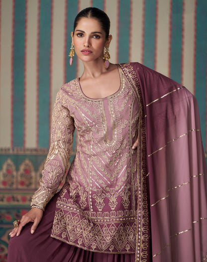 Close view of embroidery on wine sharara suit
