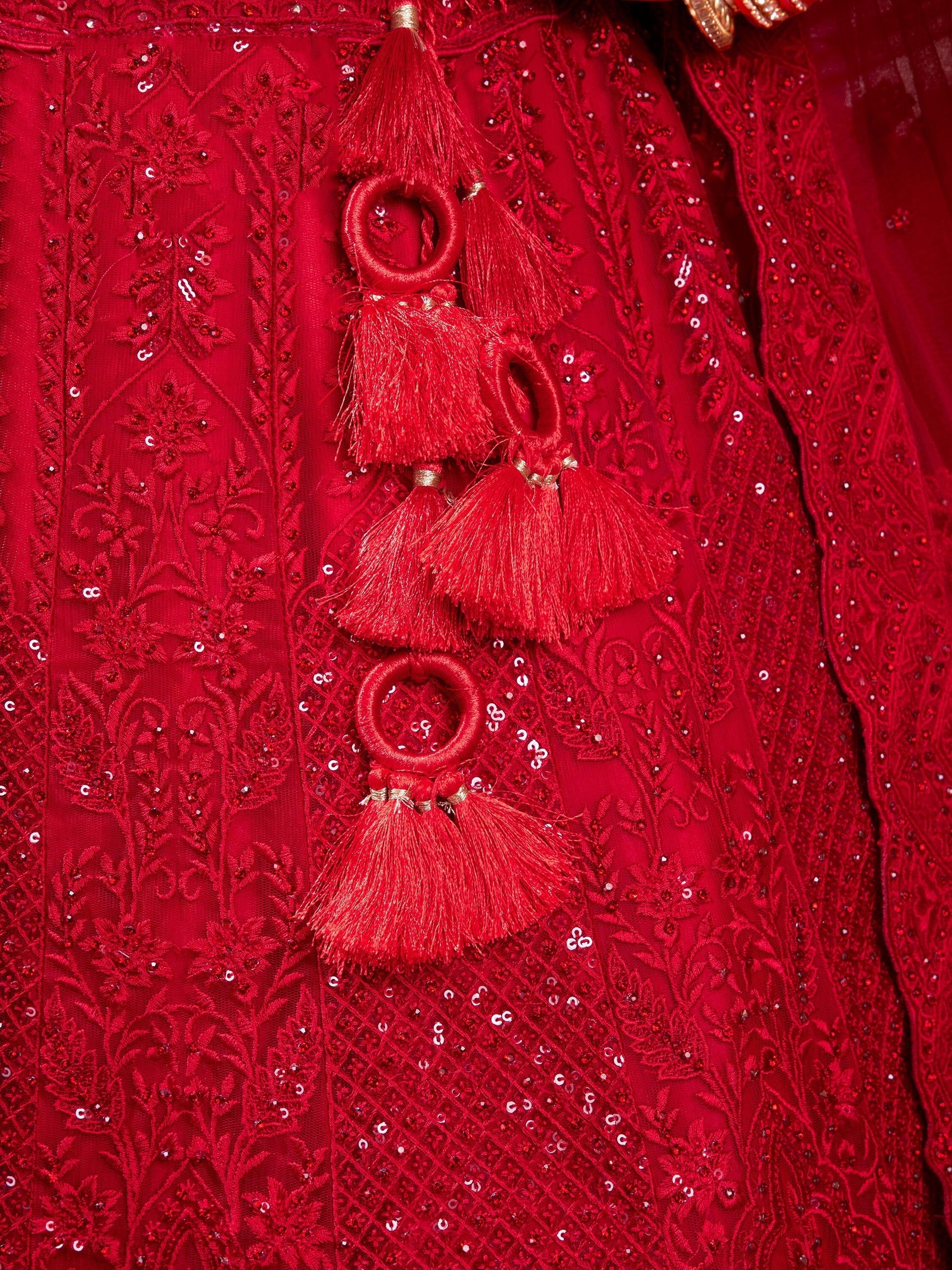 "Runway Red: Statement Bridal Lehenga with Contemporary Flair"