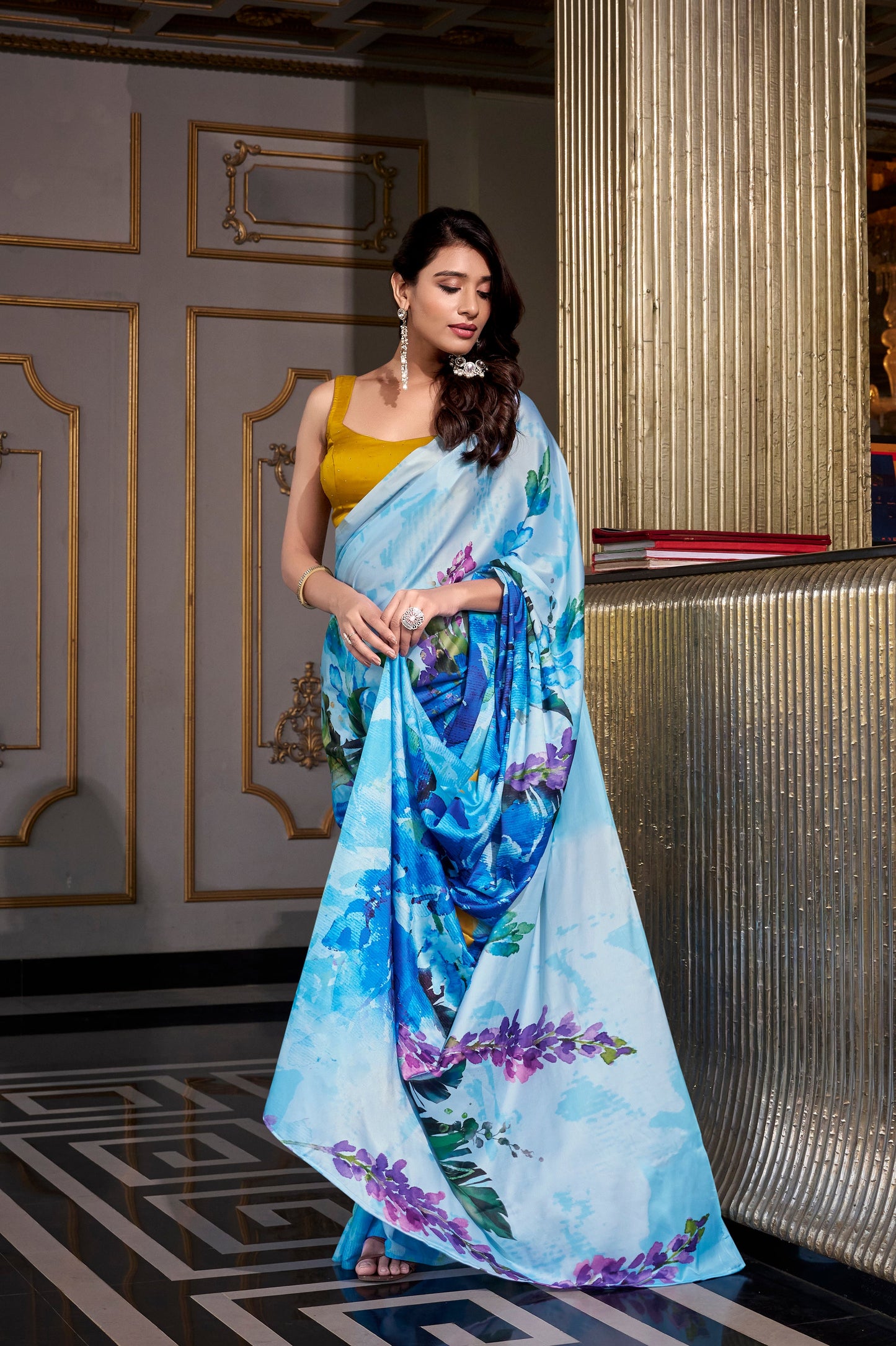 Beautiful Blue Saree Adorned With Delicate Floral Patterns, Perfect For Festive And Casual Occasions
