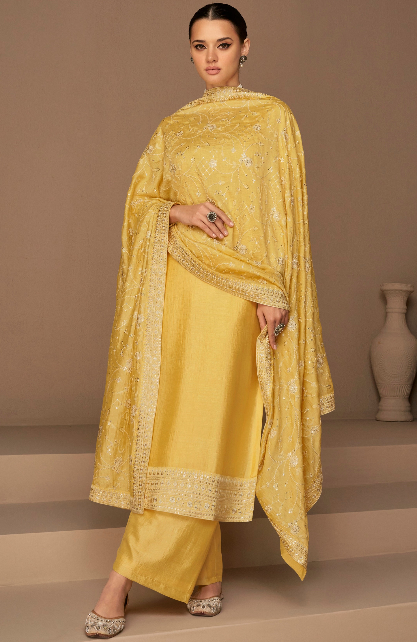 Close-up of embroidery work on silk salwar kameez