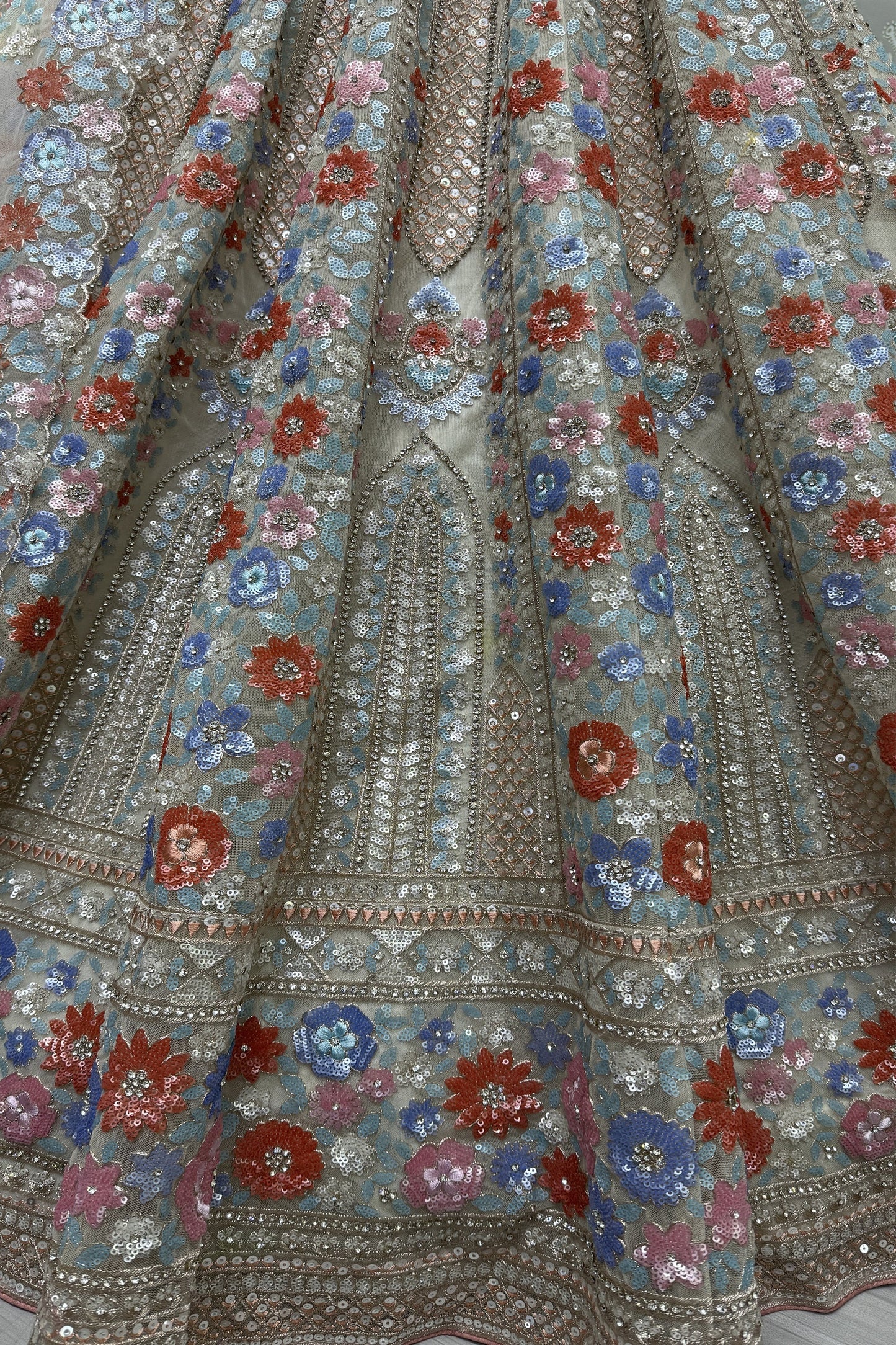 Elegant net lehenga with heavy embroidery for wedding party