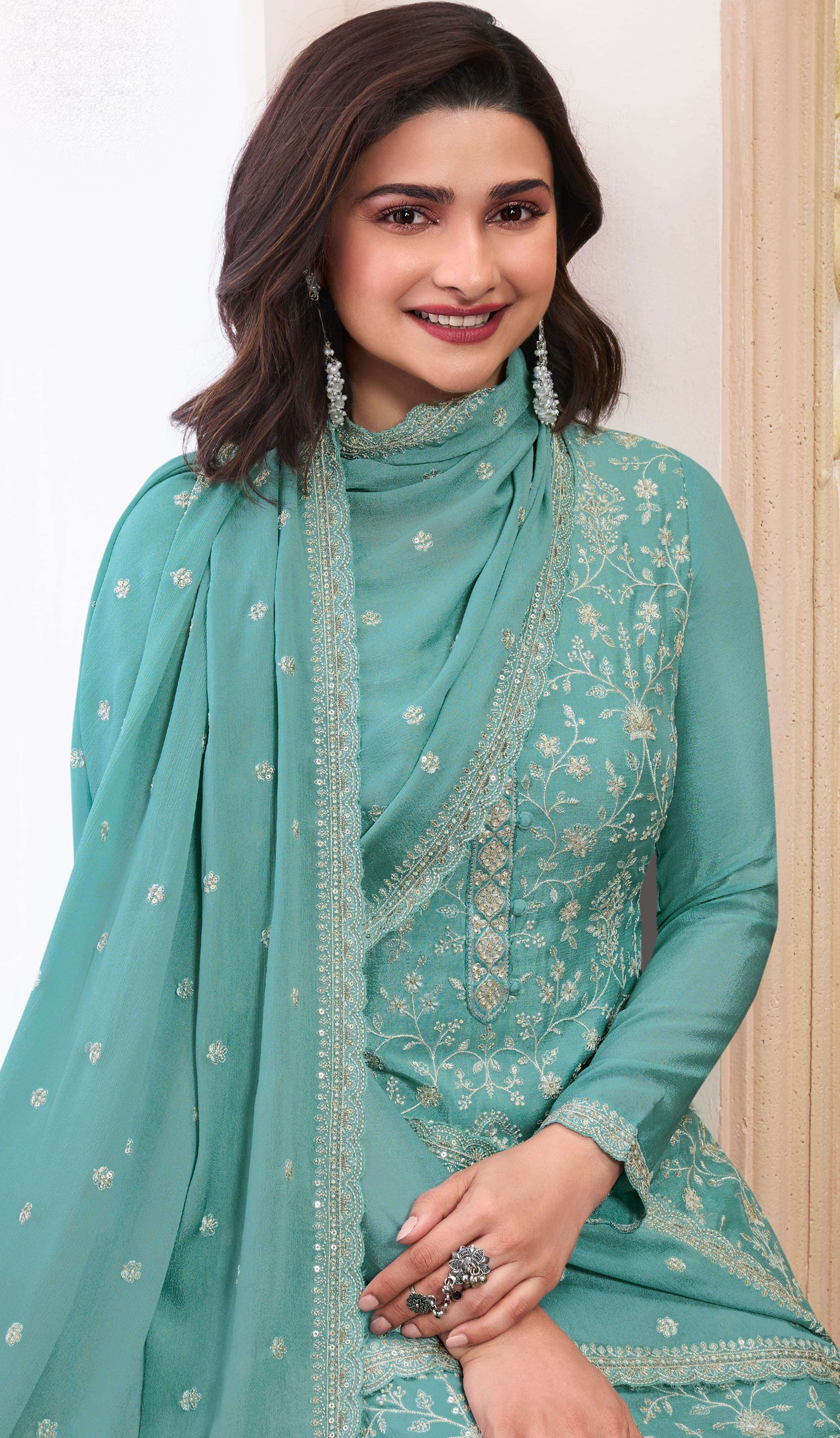 Close-up embroidered chinon kameez detail wedding outfit
