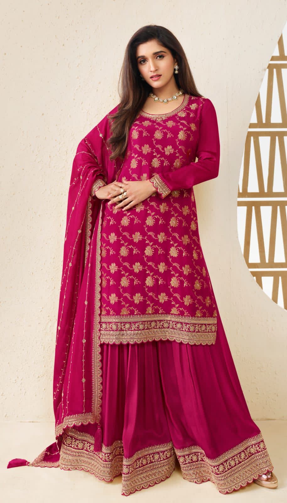 A Woman Wearing a Traditional Pakistani Salwar Kameez Dupatta Suit 
