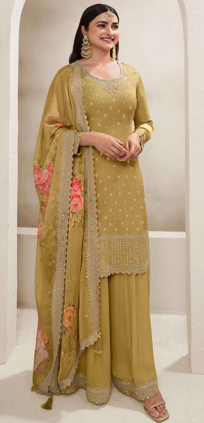 A Woman Wearing a Yellow Chinon Silk Salwar Kameez with Digital Printed Dupatta, Featuring Thread Embroidery Work.