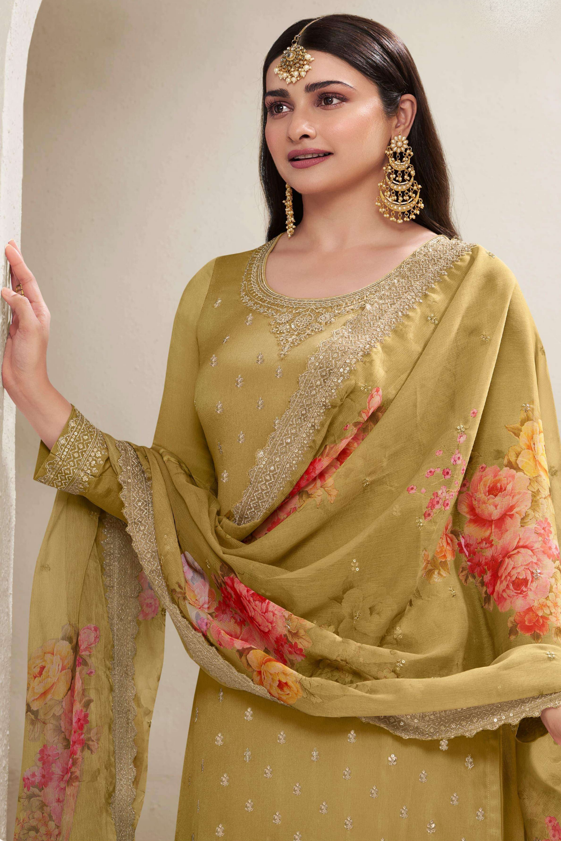 A Woman Wearing a Yellow Chinon Silk Salwar Kameez with Digital Printed Dupatta, Featuring Thread Embroidery Work.