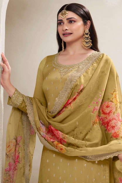 A Woman Wearing a Yellow Chinon Silk Salwar Kameez with Digital Printed Dupatta, Featuring Thread Embroidery Work.