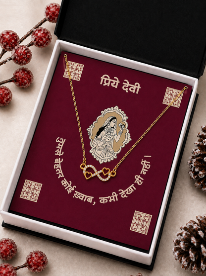 Gold-tone infinity pendant necklace with h art-shaped details for Devi