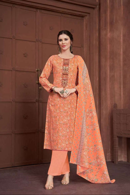 Orange cotton dress with embroidered detailing for wedding wear