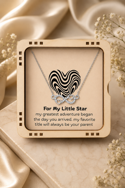 Emotional parent gift featuring a heart infinity necklace and Little Star keepsake message card