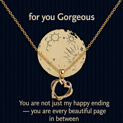 Gold-tone alloy necklace with heart pendant and round engraved-style celestial pendant