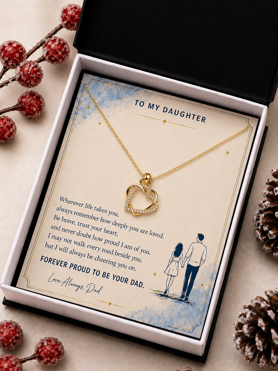 Gold-tone daughter heart necklace presented in black jewelry gift box