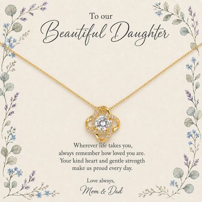 Gold-tone daughter pendant necklace with clear center stone and floral message card