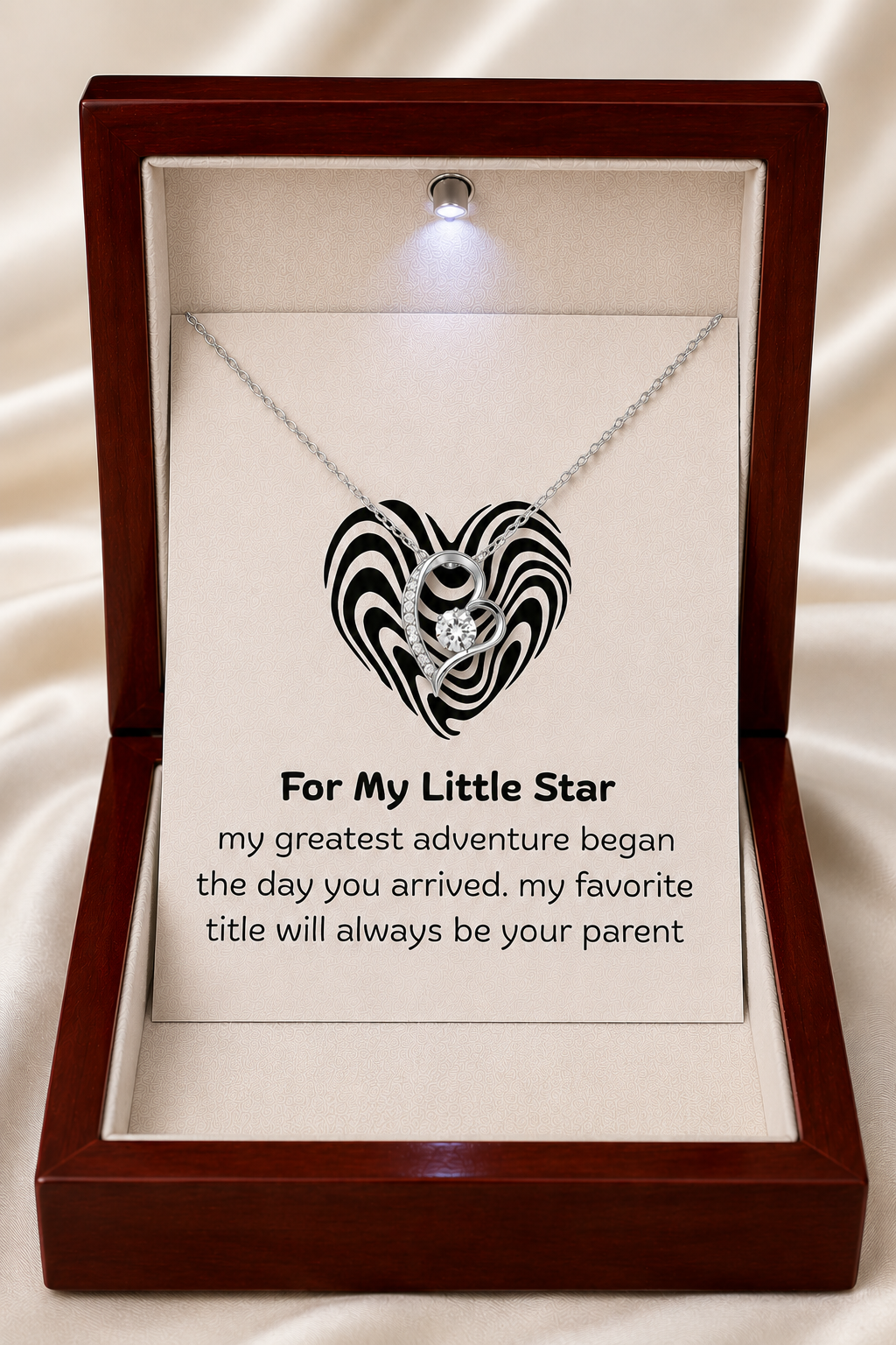 Silver-tone alloy heart pendant displayed inside premium jewelry gift box