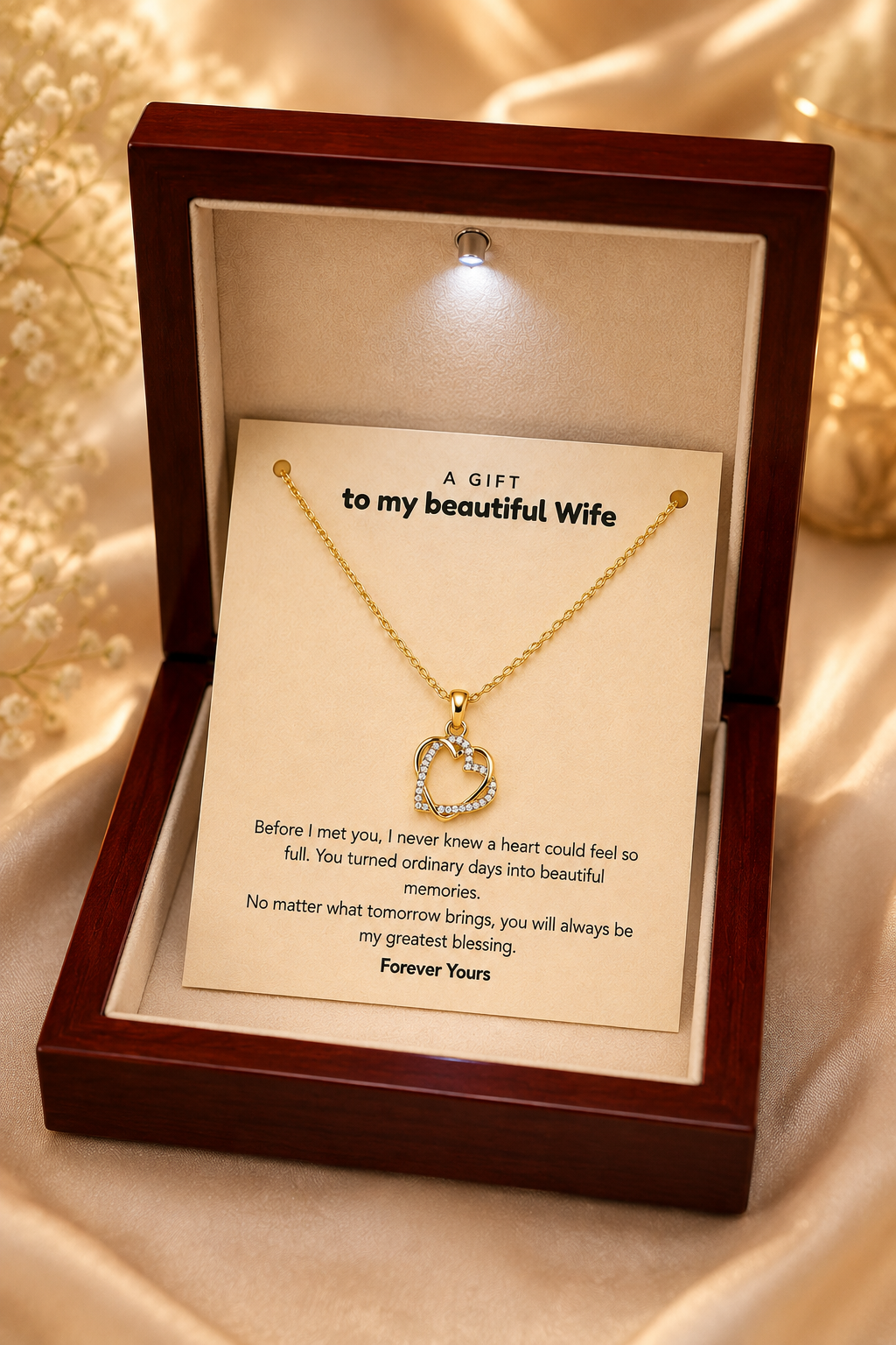 Gold-tone heart pendant necklace and emotional message card close-up