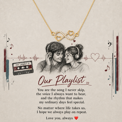 Gold-tone infinity heart necklace with clear crystal-style accents and Our Playlist card