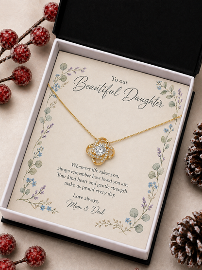 Gold-tone knot pendant necklace presented on Beautiful Daughter message card