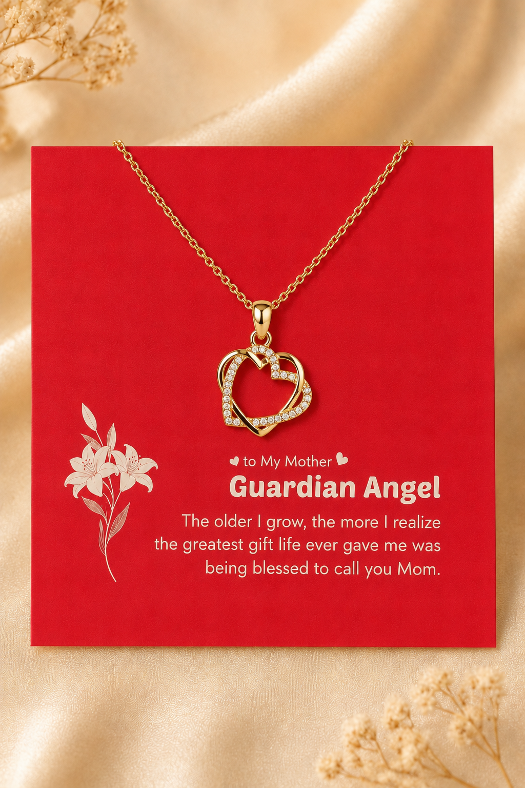 Gold-tone mother heart necklace displayed on emotional red message card