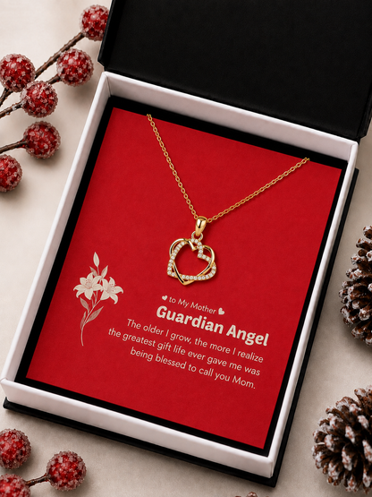 Gold-tone Mother heart necklace inside black presentation box
