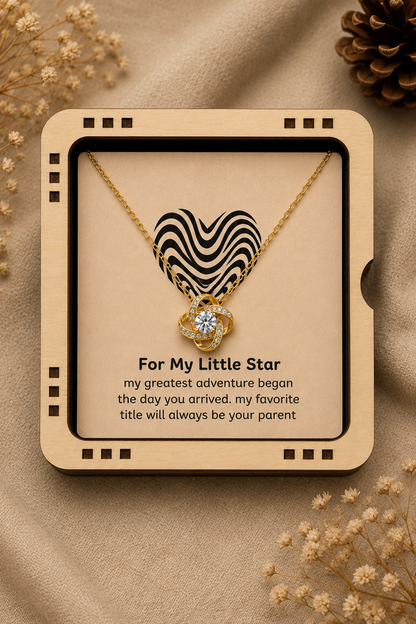 Gold-tone heart pendant with clear stone-style accent