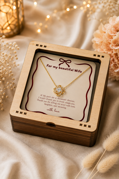 Gold-tone romantic pendant necklace with crystal-style accent details