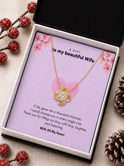 Gold-tone wife necklace with clear center stone and crystal-style accents