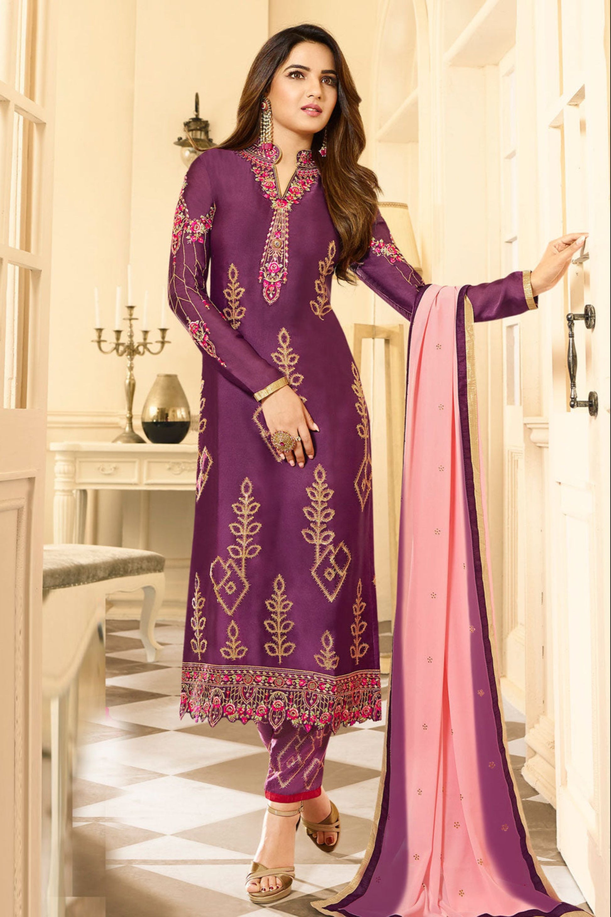 Close-up of embroidery work on purple kameez