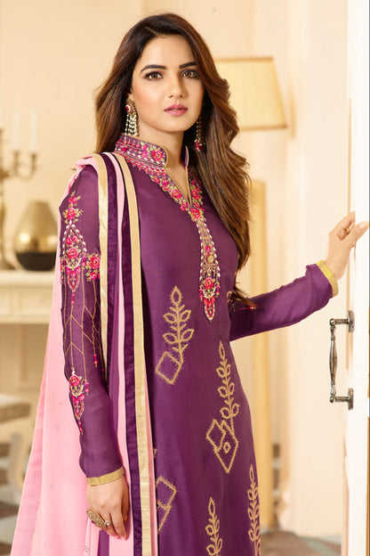 Side angle of purple salwar kameez showing drape