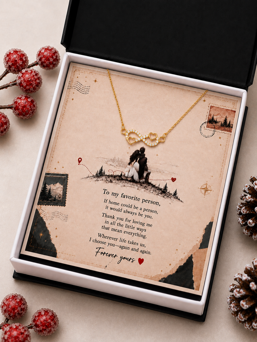 Gold-tone infinity heart necklace displayed on romantic travel-inspired message card