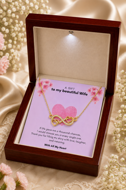 Infinity heart necklace and message card arranged in elegant jewelry box