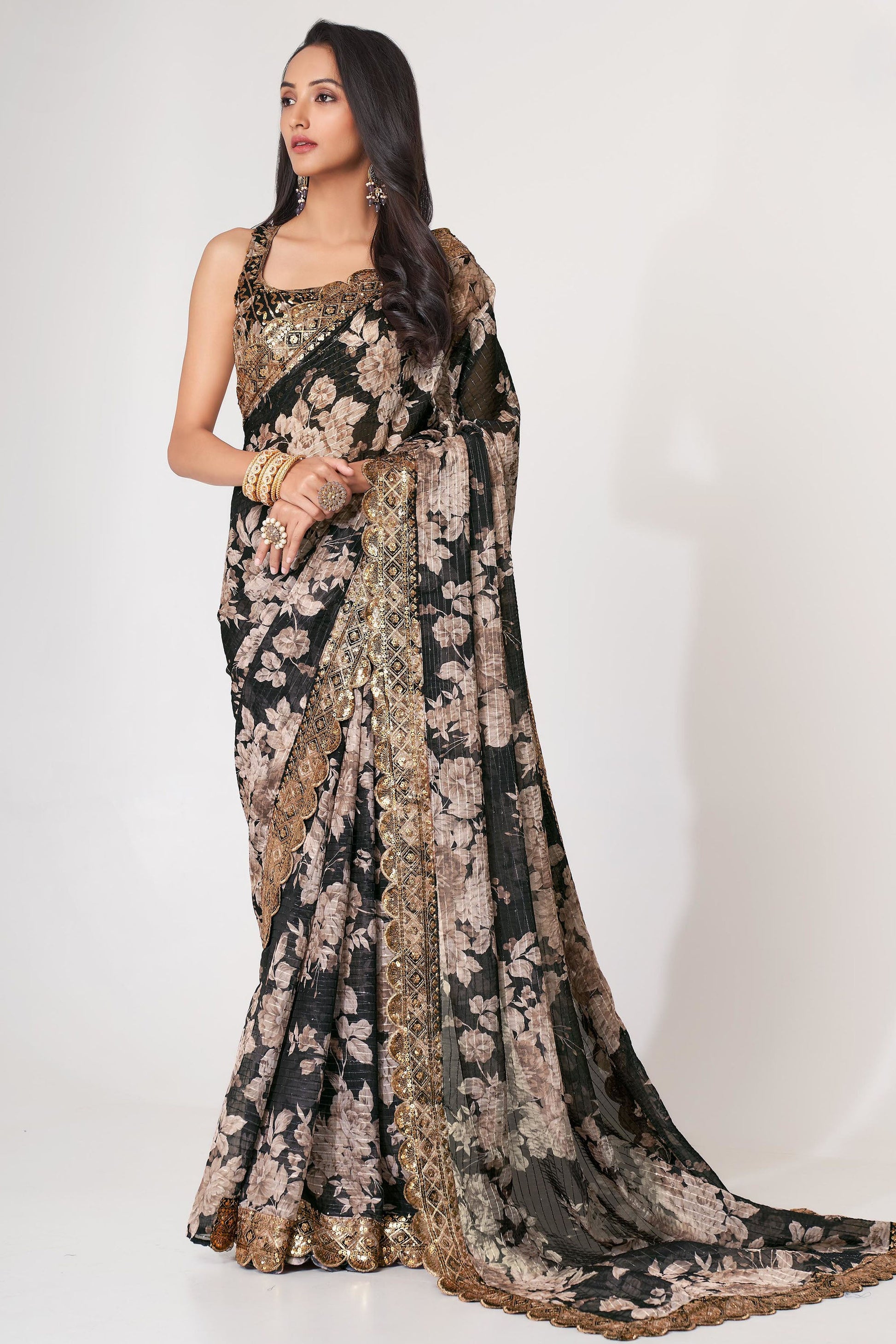 Black Saree defines elegance and confidence – perfect for evening parties and receptions. 