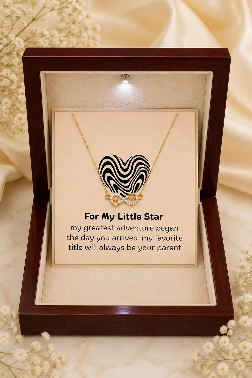 Silver-tone heart necklace with clear crystal-style accents and sentimental message card for a child