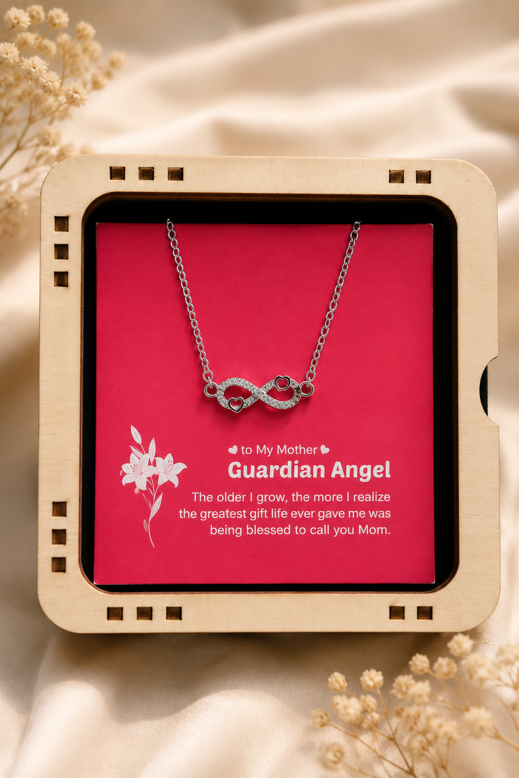 Mother Guardian Angel infinity necklace in silver-tone finish displayed in wooden gift box