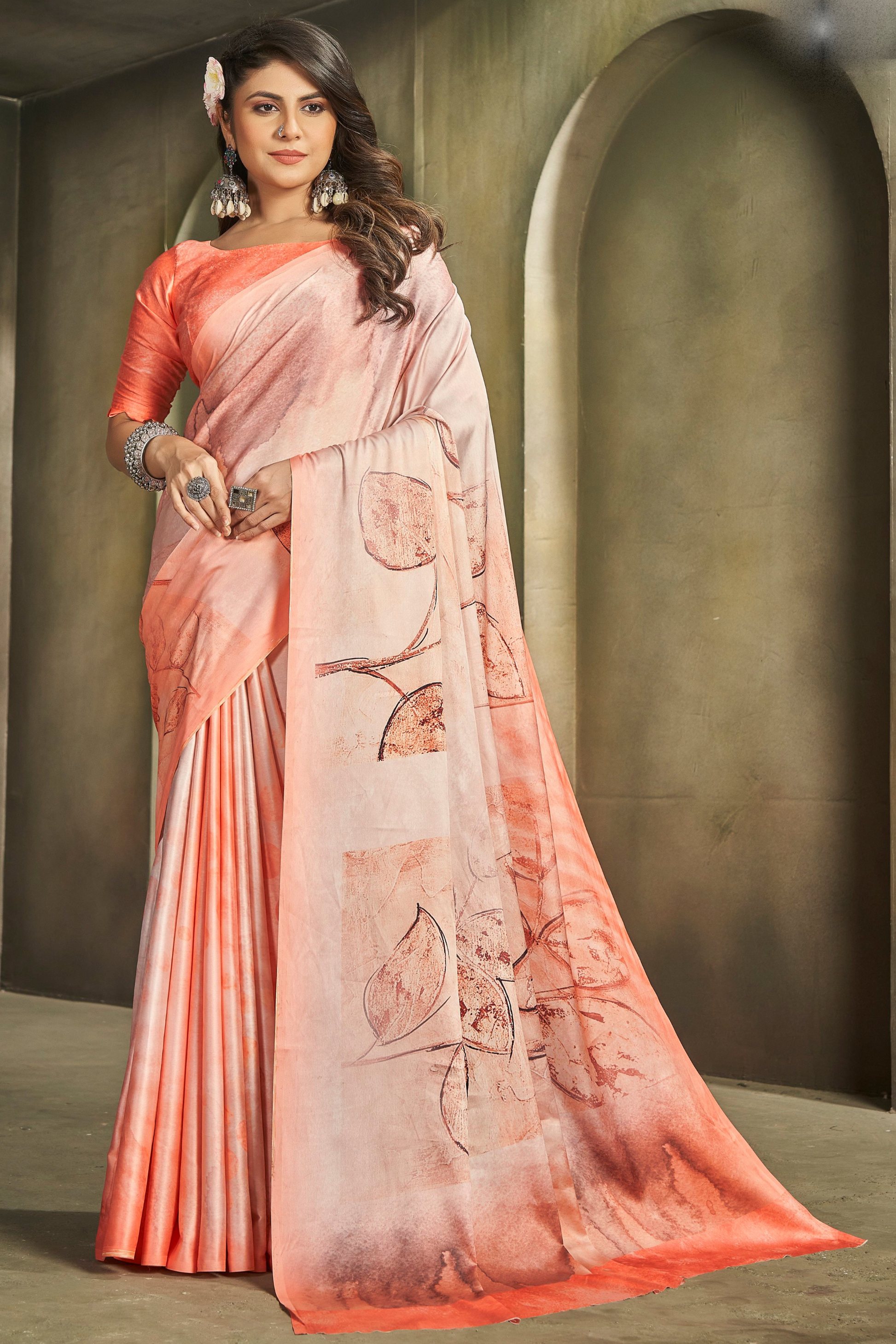 Orange Saree radiates warmth and vibrance â€“ perfect for traditional functions and cultural flair. 