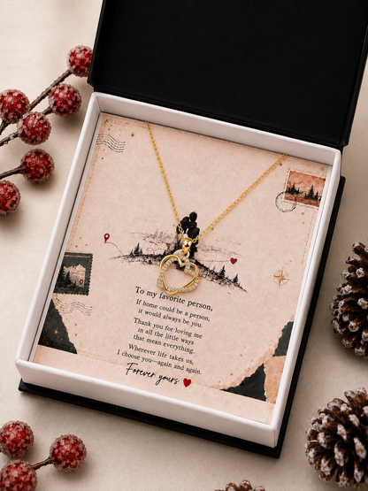 Open heart pendant with clear accents and gold-tone chain