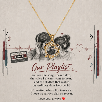 Heart pendant necklace displayed over Our Playlist message card