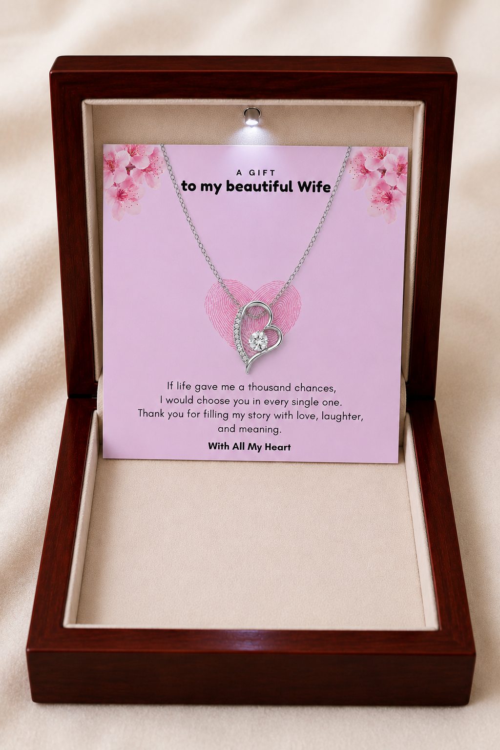 Sentimental necklace gift for wife with sparkling heart pendant and love message.