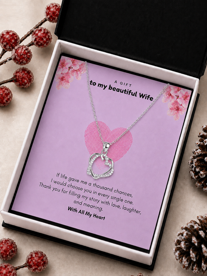 Seyuri wife interlocking heart silver-tone necklace displayed inside an illuminated gift box