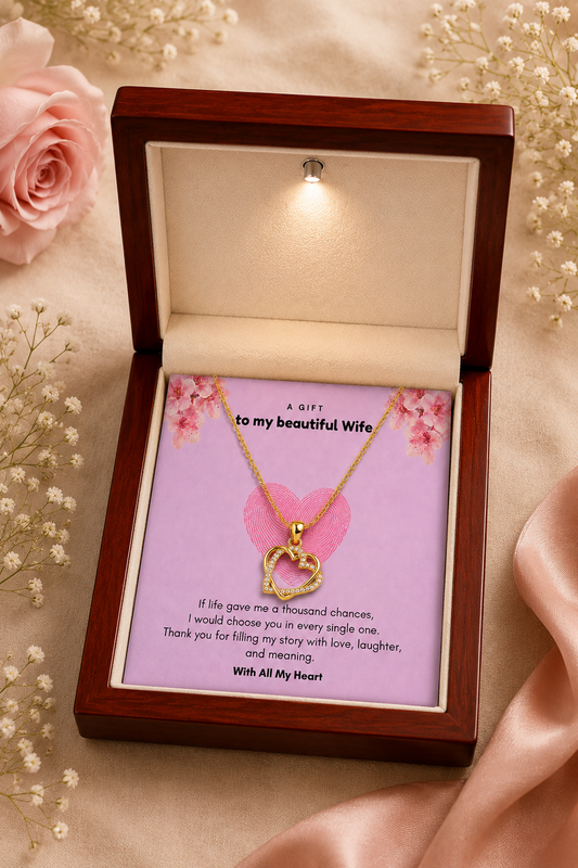 Gold-tone interlocking hearts necklace for wife placed inside a classic rustic wooden box with message card.