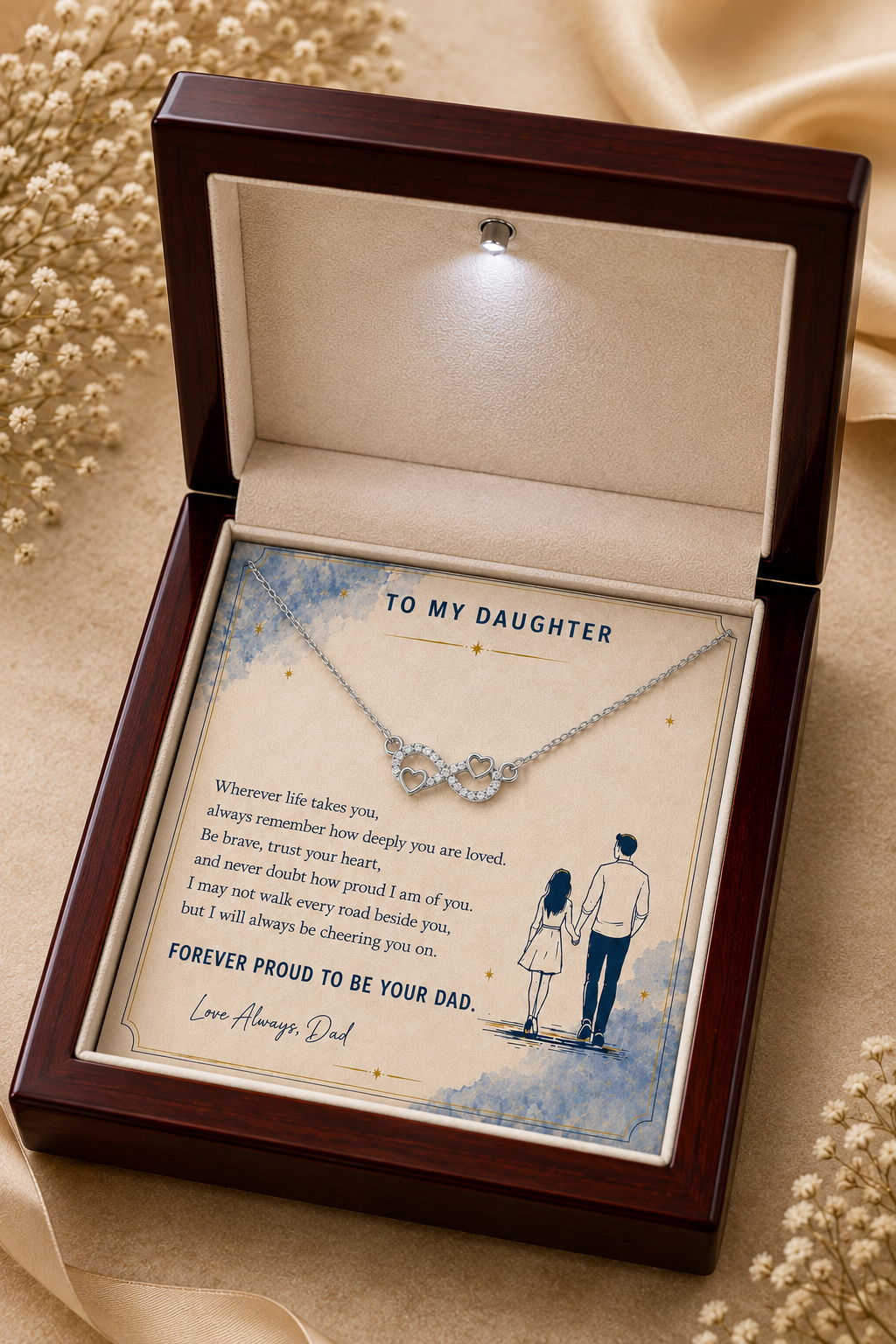 Silver-tone daughter infinity heart necklace presented on message card inside gift box