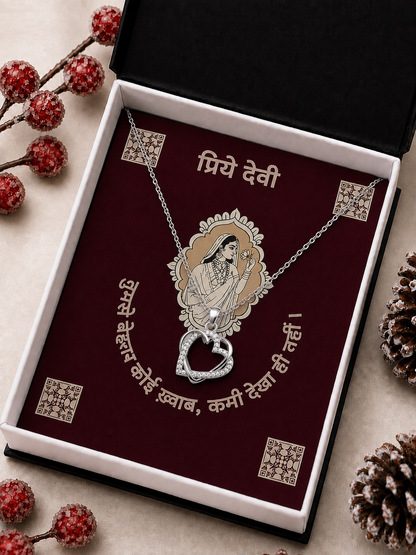 Silver-tone heart pendant necklace with clear stone-style accents and Hindi message card