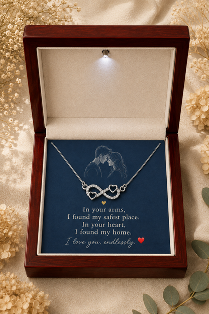 Silver-tone heart infinity pendant with crystal-style accents