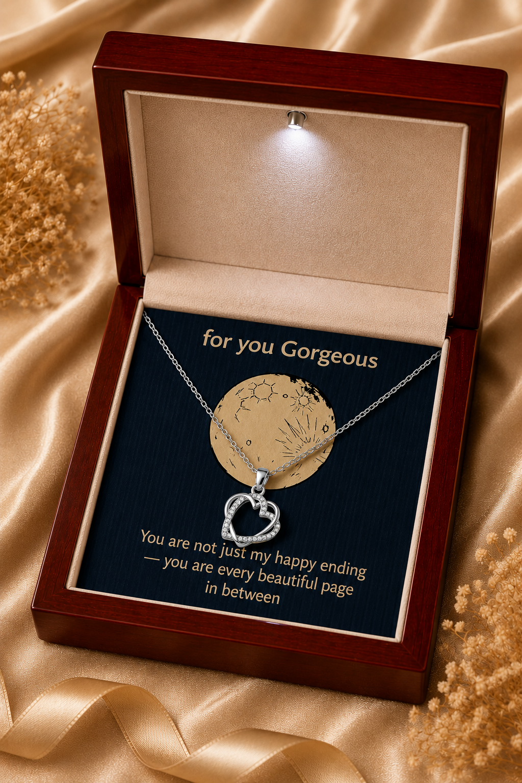 Silver-tone heart necklace with clear crystal-style accents and sentimental message card