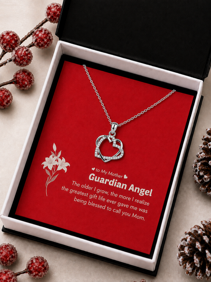 Silver-tone Mother heart necklace inside black presentation box