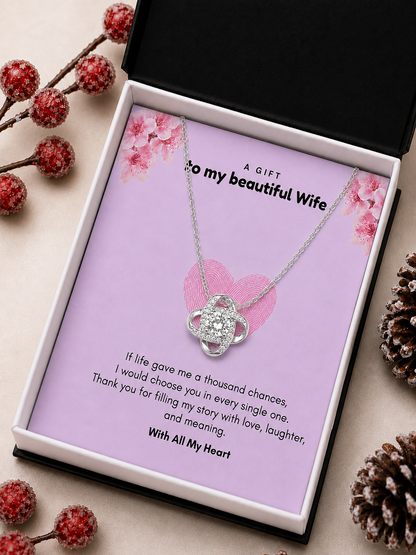 Silver-tone wife necklace with clear center stone and crystal-style accents